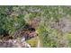 Secluded home nestled amongst a canopy of tall, mature trees on an oversized lot at 9491 Hidden Branch Dr, Jonesboro, GA 30236