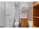 Neutral bathroom with updated vanity, cabinets, and fixtures at 9491 Hidden Branch Dr, Jonesboro, GA 30236