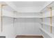Walk-in closet with adjustable shelving at 9491 Hidden Branch Dr, Jonesboro, GA 30236