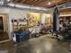 Basement area with exposed ceiling, work bench, and punching bag at 946 Creek Run Pl, Temple, GA 30179