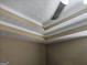 White ceiling with layered treys trimmed in molding at 946 Creek Run Pl, Temple, GA 30179