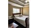 Cozy main bedroom with a comfortable bed and a view from the window at 946 Creek Run Pl, Temple, GA 30179