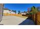 A newly-sodded backyard featuring a full fence and an extended concrete patio great for activities at 7926 Palomino Pass, Riverdale, GA 30274