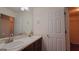 Bathroom featuring double sinks with modern fixtures, and a vanity at 7926 Palomino Pass, Riverdale, GA 30274