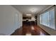 Open kitchen with black appliances, a center island, and views of the living room at 7926 Palomino Pass, Riverdale, GA 30274