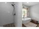 Beautiful bathroom showcasing tiled shower and modern freestanding tub at 1500 Highway 155 North, Mcdonough, GA 30252