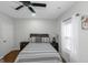 Comfortable bedroom with ceiling fan, neutral colored decor and window at 1500 Highway 155 North, Mcdonough, GA 30252