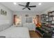 Bright bedroom with ceiling fan, and neutral colored decor and window at 1500 Highway 155 North, Mcdonough, GA 30252