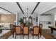 Formal dining room with seating for eight is adjacent to the kitchen and living area at 1500 Highway 155 North, Mcdonough, GA 30252