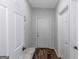 Entryway hallway with neutral paint and tile flooring at 1500 Highway 155 North, Mcdonough, GA 30252