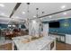 Large kitchen with granite island with seating that is open to the dining room, living room and entertainment area at 1500 Highway 155 North, Mcdonough, GA 30252