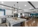 Spacious kitchen boasts an island with granite countertops that looks to the eat-in kitchen and living area at 1500 Highway 155 North, Mcdonough, GA 30252