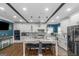 Gourmet kitchen with granite countertops, white cabinetry, and a large center island at 1500 Highway 155 North, Mcdonough, GA 30252