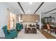 Comfortable living room with textured wall design, neutral sofa, and bright windows at 1500 Highway 155 North, Mcdonough, GA 30252