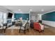 Open-concept living room with modern furnishings, a fireplace, and an adjacent seating area at 1500 Highway 155 North, Mcdonough, GA 30252