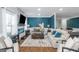 Bright living area with a fireplace, adjacent seating area and stylish decor at 1500 Highway 155 North, Mcdonough, GA 30252