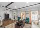 Bright and airy living room with tile floors, stylish decor, and modern furnishings at 1500 Highway 155 North, Mcdonough, GA 30252
