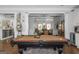 Attractive recreation space includes a pool table next to the living and dining areas at 1500 Highway 155 North, Mcdonough, GA 30252