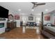 Large main bedroom suite features a seating area, canopy bed, electric fireplace, hardwood floors, and lots of natural light at 1500 Highway 155 North, Mcdonough, GA 30252
