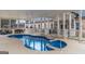 Covered pool with adjacent outdoor seating and entertainment area at 1500 Highway 155 North, Mcdonough, GA 30252