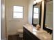 Elegant bathroom featuring double sinks, stylish mirrors, and ample counter space at 3647 Glen Mora Dr, Decatur, GA 30032
