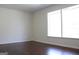 Serene bedroom with hardwood floors and a bright window creating a cozy atmosphere at 3647 Glen Mora Dr, Decatur, GA 30032