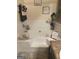 Relaxing bathroom features a soaking tub, soft lighting, and decorative accents for a spa-like experience at 7193 Cavender Sw Dr, South Fulton, GA 30331