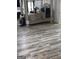 A well appointed bedroom featuring a wooden floor, large bed and cozy decor at 7193 Cavender Sw Dr, South Fulton, GA 30331