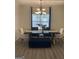 Elegant dining room featuring modern lighting, contemporary decor, and comfortable seating at 7193 Cavender Sw Dr, South Fulton, GA 30331