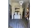 Elegant entryway featuring stylish decor, modern lighting, and sleek flooring at 7193 Cavender Sw Dr, South Fulton, GA 30331