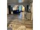 Beautiful open-concept living room showcasing hardwood floors, elegant decor, and comfortable blue sectional at 7193 Cavender Sw Dr, South Fulton, GA 30331