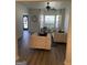 Well-lit living room featuring comfortable seating, stylish decor, and a serene atmosphere at 7193 Cavender Sw Dr, South Fulton, GA 30331