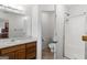 Bathroom featuring a shower, vanity, and separate toilet area at 628 Morningside Dr, Stockbridge, GA 30281