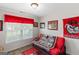 Cozy bedroom adorned with team decor and plush carpeting at 628 Morningside Dr, Stockbridge, GA 30281