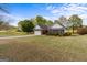 A charming single-story brick house sits on a spacious lot with a lush green lawn at 628 Morningside Dr, Stockbridge, GA 30281