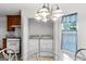Adjacent to kitchen, laundry closet offers front load washer and dryer at 628 Morningside Dr, Stockbridge, GA 30281