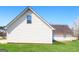 Charming home exterior with traditional siding, manicured lawn, and mature trees at 136 Leguin Forest Dr, Locust Grove, GA 30248