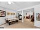 Spacious basement featuring an air hockey table, exercise equipment, and desk area at 643 Old Greenville Rd, Fayetteville, GA 30215