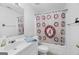 Bathroom with a shower and Alabama Crimson Tide shower curtain at 643 Old Greenville Rd, Fayetteville, GA 30215