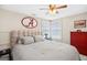 Bedroom with an Alabama 'A' on the wall, carpet and natural light from the windows at 643 Old Greenville Rd, Fayetteville, GA 30215