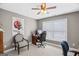 Bedroom setup as an office with desk and chair, great natural light and carpet at 643 Old Greenville Rd, Fayetteville, GA 30215