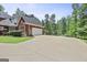 Spacious driveway leading to a two-car garage with ample parking space at 643 Old Greenville Rd, Fayetteville, GA 30215