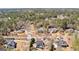 A neighborhood aerial shot showcasing winding streets, mature trees and manicured lawns at 300 Tarragon Dr, Fayetteville, GA 30215