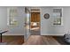 Basement area featuring a glass door to the outside and plank flooring at 300 Tarragon Dr, Fayetteville, GA 30215