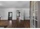 Finished basement space with wood-look flooring and access to other rooms at 300 Tarragon Dr, Fayetteville, GA 30215