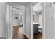 Hallway view of bathroom and game room at 300 Tarragon Dr, Fayetteville, GA 30215
