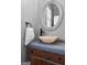 Chic bathroom showcasing a vessel sink, vintage-style vanity, and decorative mirror, offering a unique design at 300 Tarragon Dr, Fayetteville, GA 30215