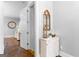 Bright entryway with wood floors, decor and a view to the living room at 300 Tarragon Dr, Fayetteville, GA 30215