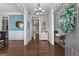 Stylish foyer showcases hardwood floors, elegant lighting and decorative accents creating a grand entrance at 300 Tarragon Dr, Fayetteville, GA 30215