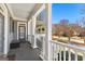 Charming front porch with gray floors, white railings, and an inviting front door at 300 Tarragon Dr, Fayetteville, GA 30215